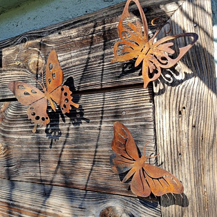 motyle z metalu malowane rdzą