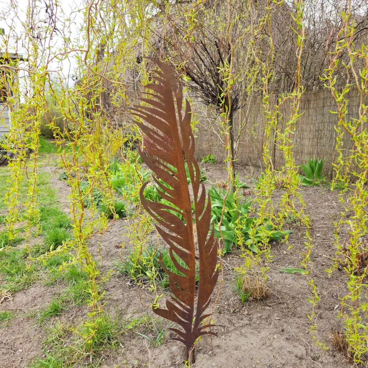 metalowa dekoracja malowana rdzą pióro.jpg